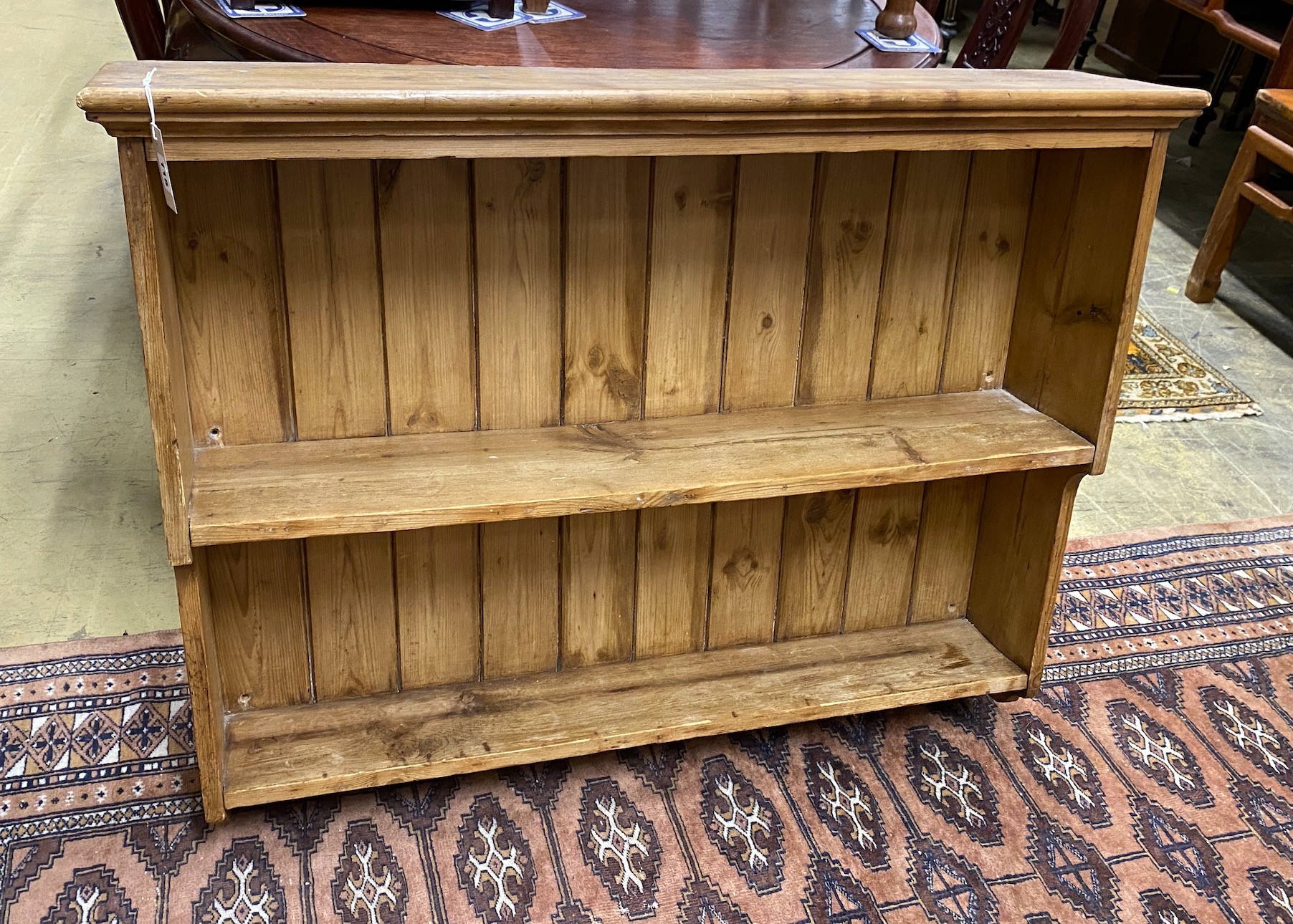 A Victorian style pine two tier wall bracket, width 112cm, depth 23cm, height 86cm